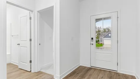 Entry way of the Chestnut by Arbor Homes, Elevation D Brick A at Abbey Commons