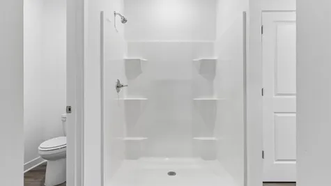 Primary bathroom walk in shower, Abbey Commons