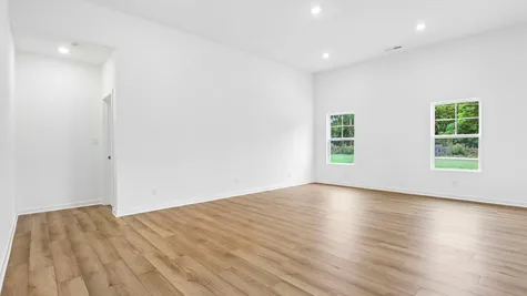 Great Room of the Chestnut by Arbors Homes with Marina vinyl plank flooring