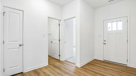Interior of the Chestnut by Arbors Homes with Marina vinyl plank flooring