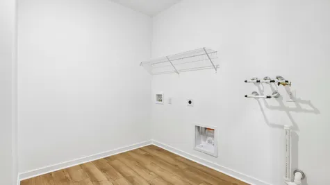Laundry room of the Chestnut by Arbor Homes