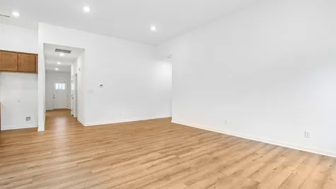 Great Room of the Chestnut by Arbors Homes with Marina vinyl plank flooring
